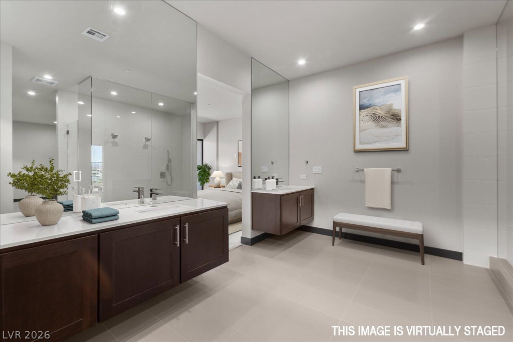 36 Rainbow Point Place Henderson, NV 89011 - Photo 18 of 34 Primary Bathroom| Shower with Bench| Dual Vanities|Dual Water Rooms|Large Closet