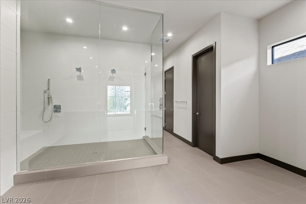 36 Rainbow Point Place Henderson, NV 89011 - Photo 20 of 34 Primary Bathroom| Shower with Bench| Dual Vanities|Dual Water Rooms|Large Closet