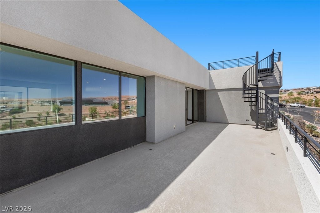 36 Rainbow Point Place Henderson, NV 89011 - Photo 25 of 34 2nd Floor Balcony| Stairway to the Sky Deck