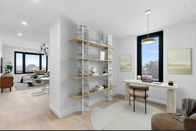 a room with a wooden floor and furniture