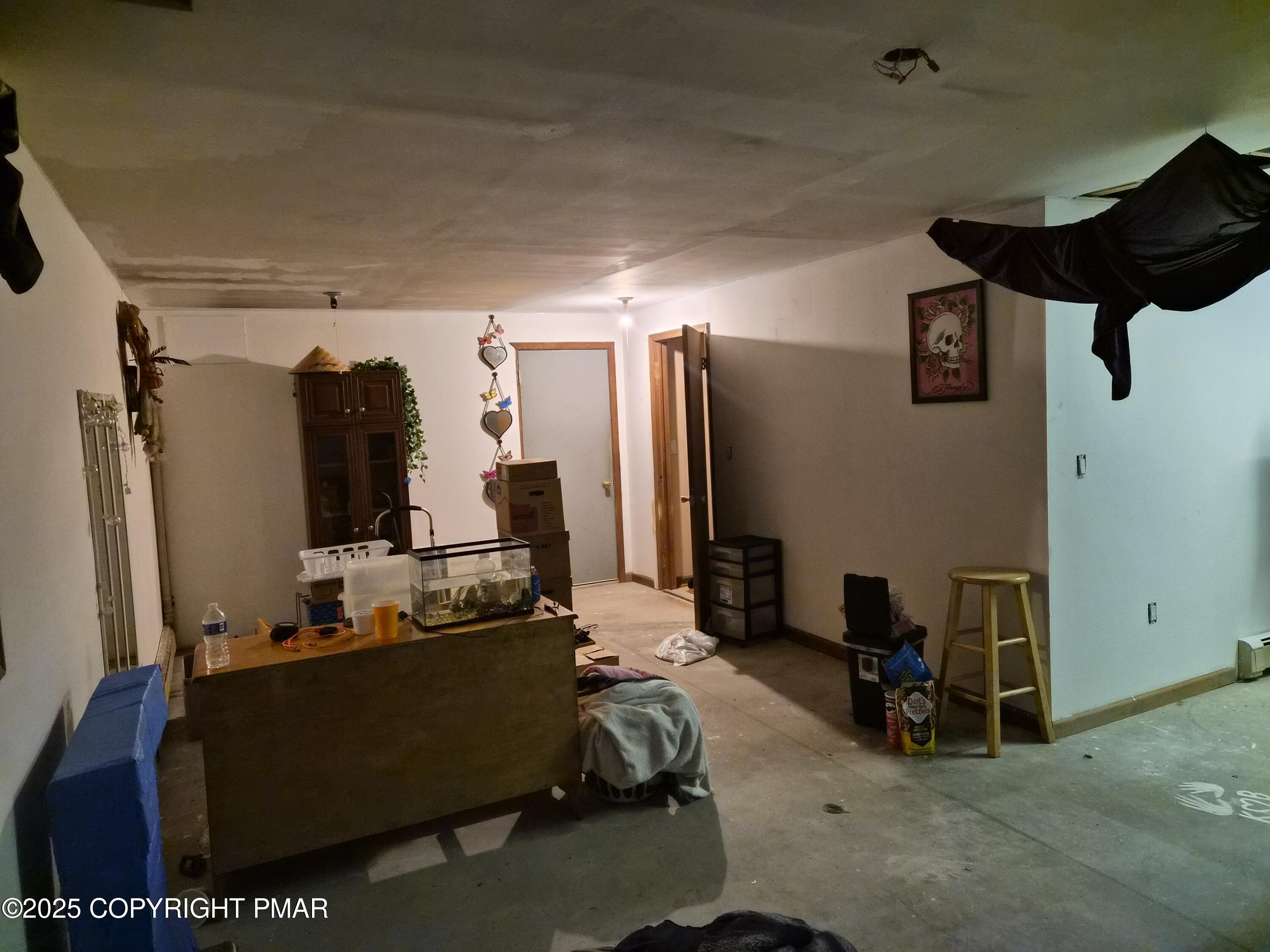 113 Olsen Road Stroudsburg, PA 18360 - Photo 18 of 22 a room with gym equipment and a mirror