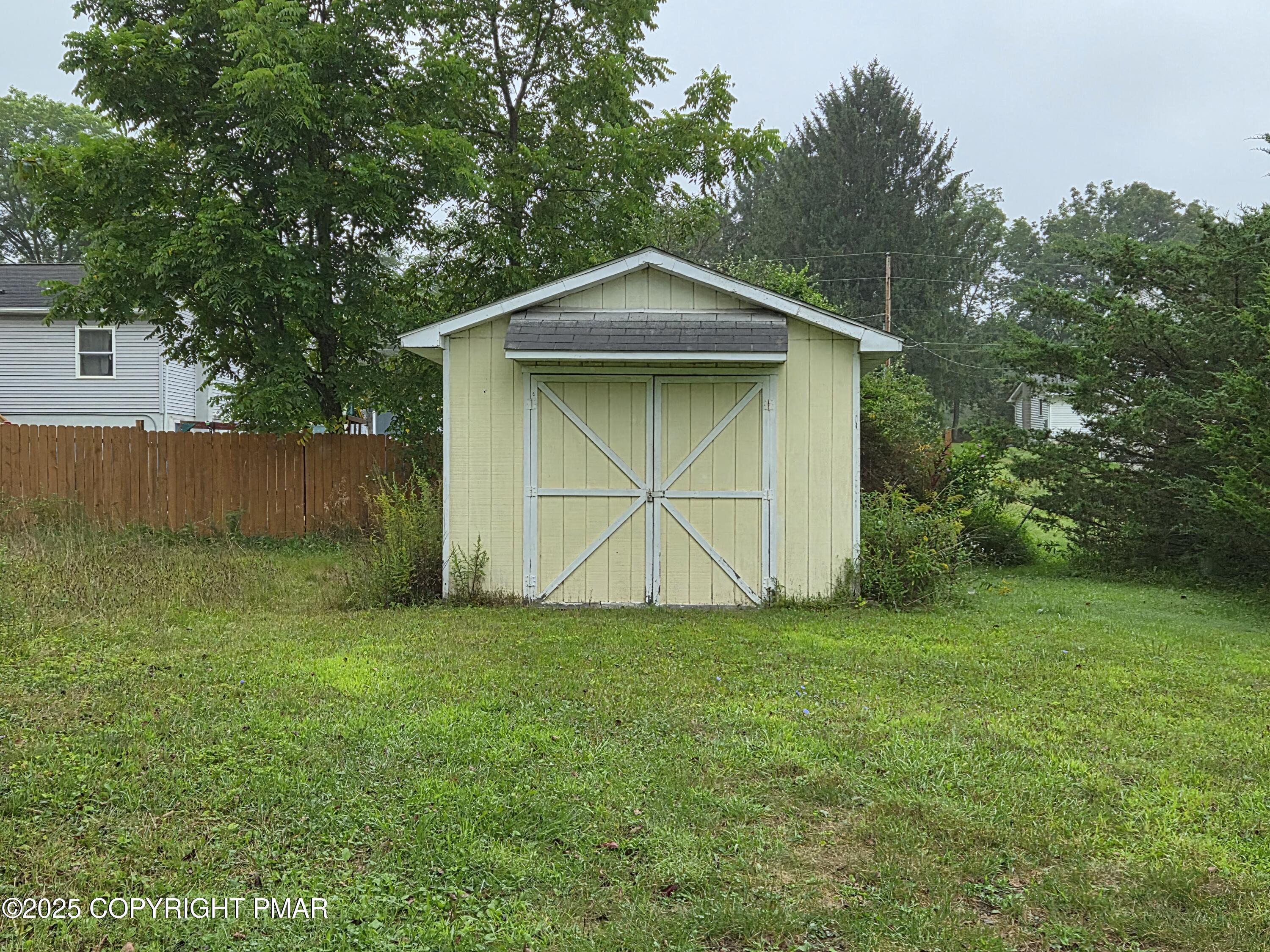 113 Olsen Road Stroudsburg, PA 18360 - Photo 20 of 22 a view of a house with a yard