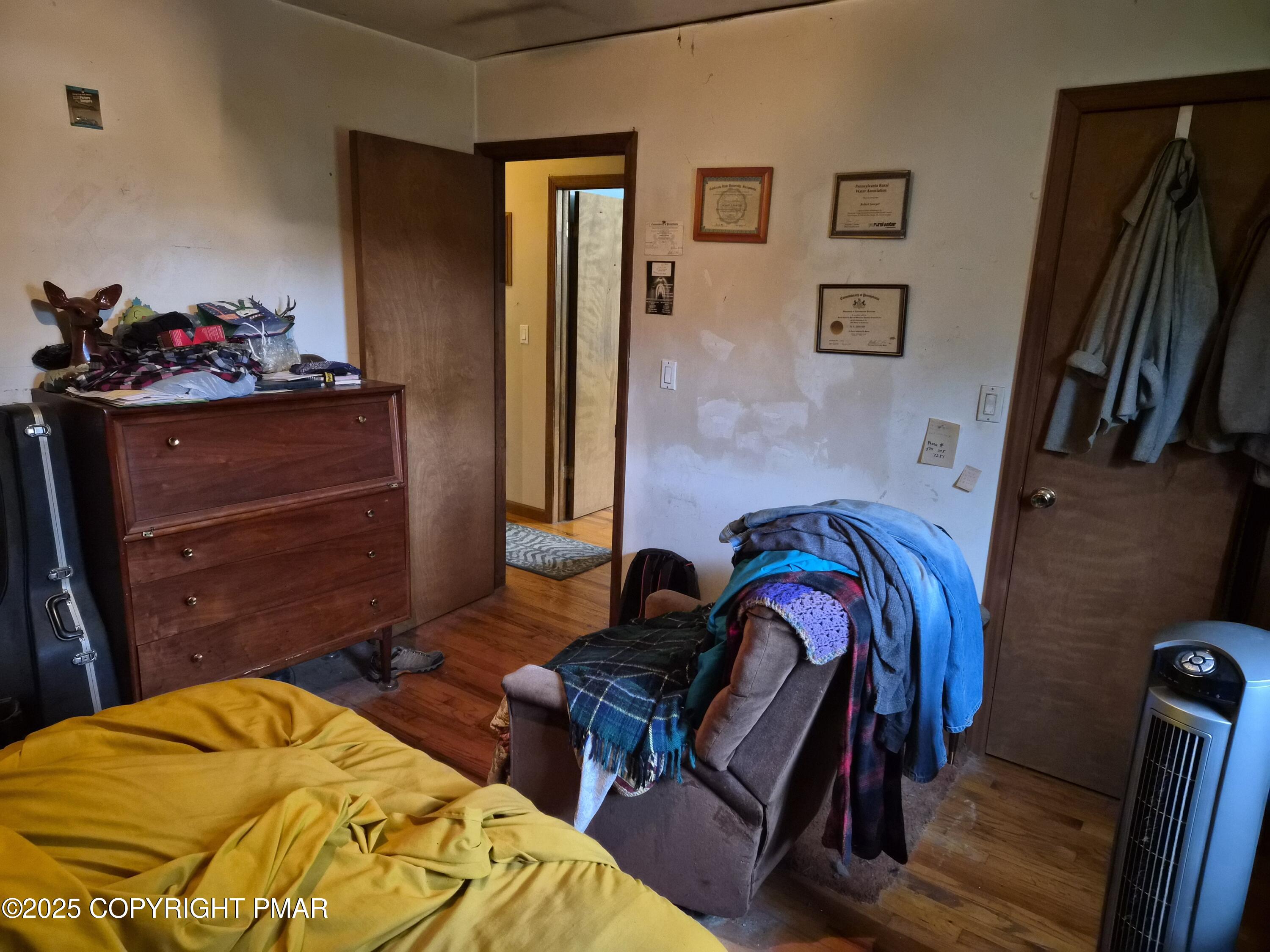 113 Olsen Road Stroudsburg, PA 18360 - Photo 10 of 22 a bedroom with a bed and wooden floor