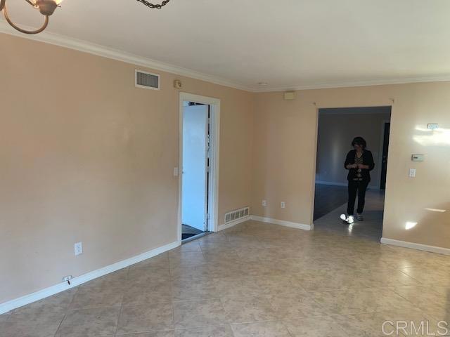 11417 Poblado Road San Diego, CA 92127 - Photo 11 of 37 a view of an empty room and fire place