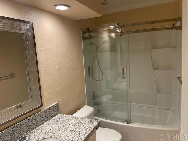 11417 Poblado Road San Diego, CA 92127 - Photo 14 of 37 a bathroom with a shower and a toilet
