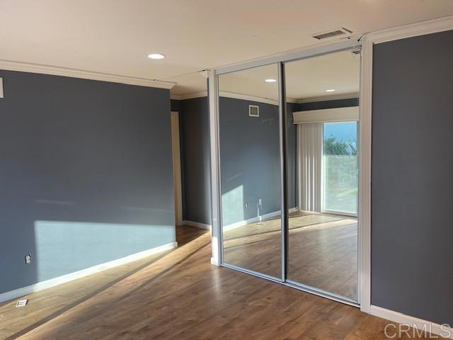 11417 Poblado Road San Diego, CA 92127 - Photo 18 of 37 a bathroom with a glass shower door