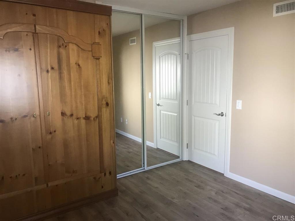 11417 Poblado Road San Diego, CA 92127 - Photo 21 of 37 a bathroom with a shower and a sink