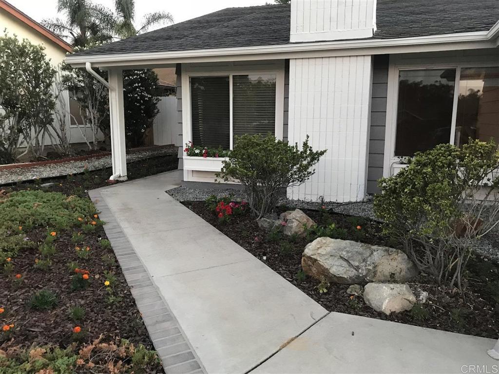 11417 Poblado Road San Diego, CA 92127 - Photo 3 of 37 front view of house with potted plant