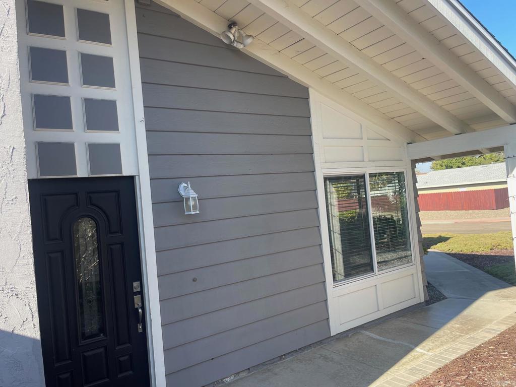 11417 Poblado Road San Diego, CA 92127 - Photo 4 of 37 a view of front door and porch