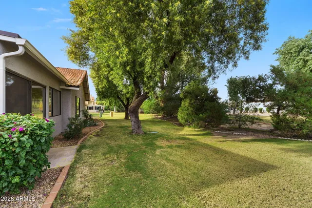 a very nice looking dining room with many windows