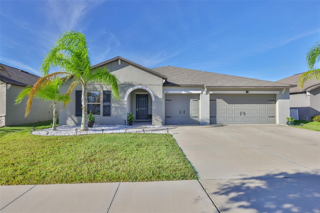 13575 Willow Bluestar Loop Riverview, FL 33579 - Photo 1 of 48 a view of a house with backyard and porch