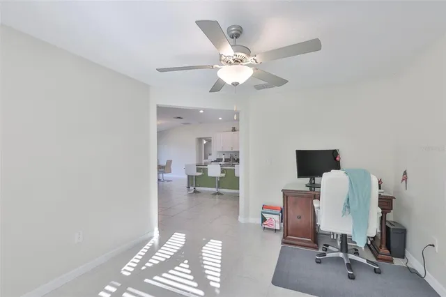 a view of a workspace with furniture