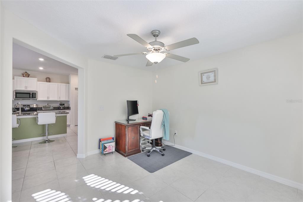13575 Willow Bluestar Loop Riverview, FL 33579 - Photo 27 of 48 a workspace with furniture and ceiling fan
