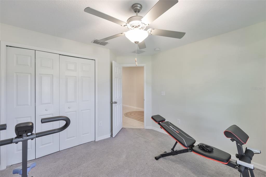 13575 Willow Bluestar Loop Riverview, FL 33579 - Photo 34 of 48 a view of a room with gym equipment
