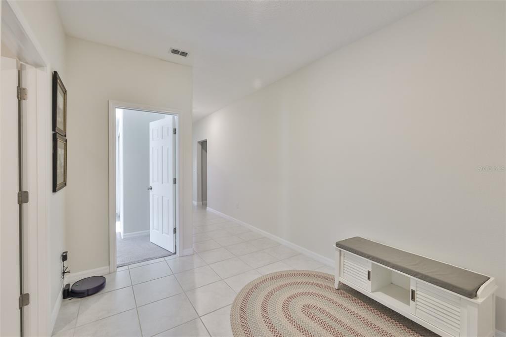 13575 Willow Bluestar Loop Riverview, FL 33579 - Photo 4 of 48 a view of a livingroom with a washer and dryer