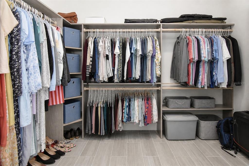 7890 Southwest 129th Avenue Cedar Key, FL 32625 - Photo 21 of 45 a view of walk in closet with clothes and shoes