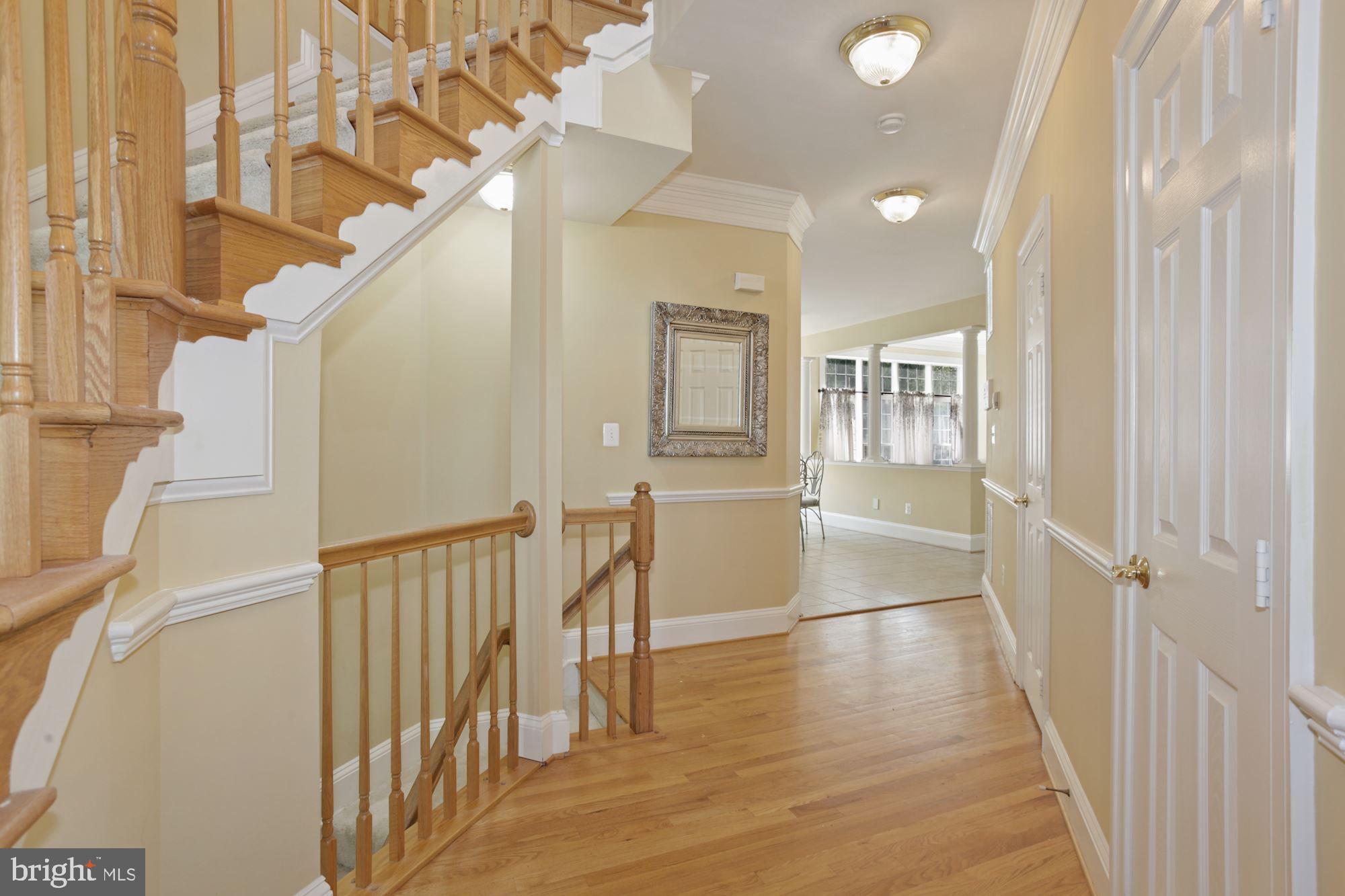 12830 Victory Lakes Loop Bristow, VA 20136 - Photo 3 of 50 Open and airy foyer.