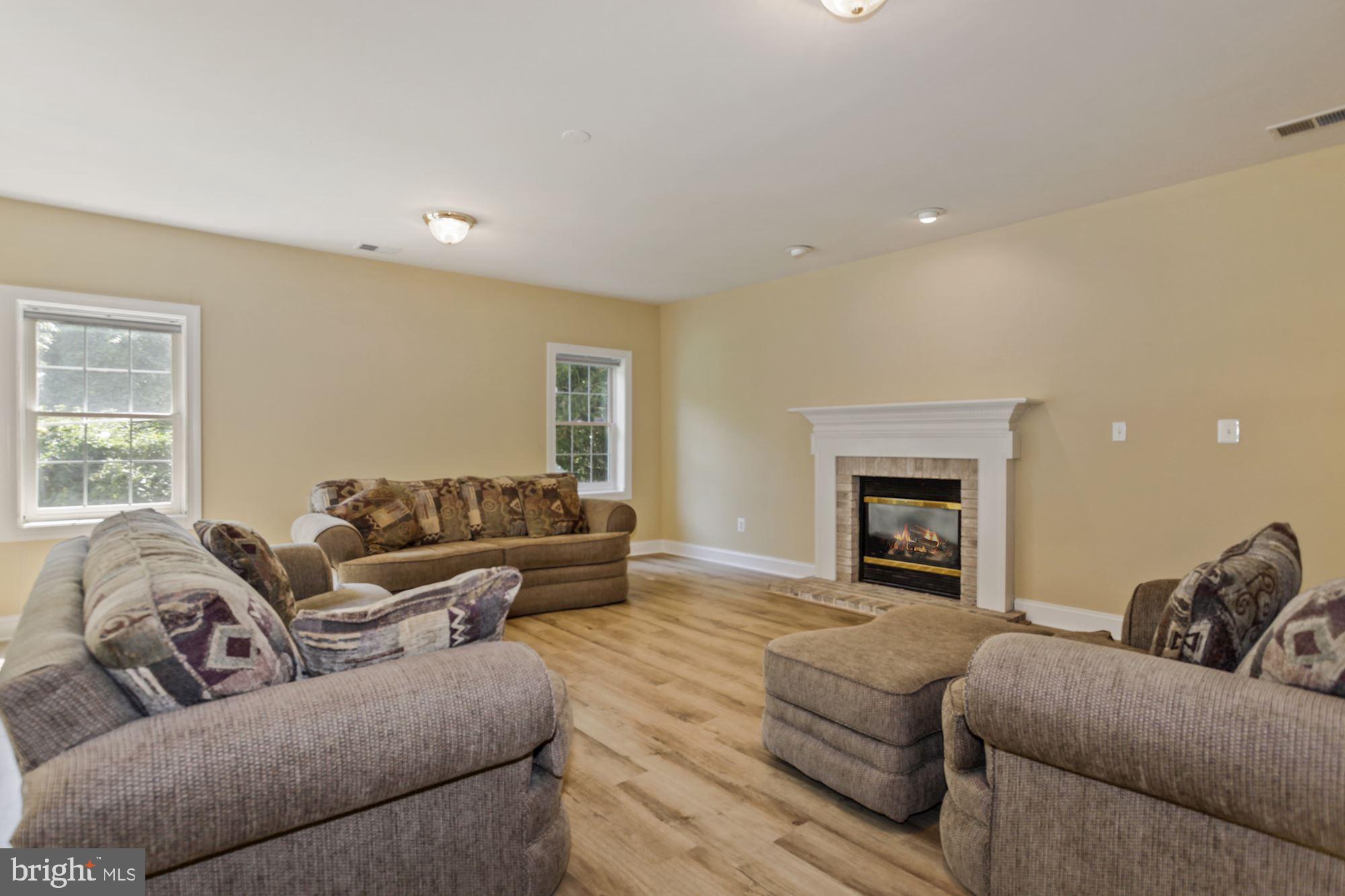 12830 Victory Lakes Loop Bristow, VA 20136 - Photo 41 of 50 HUGE REC ROOM WITH F/P!