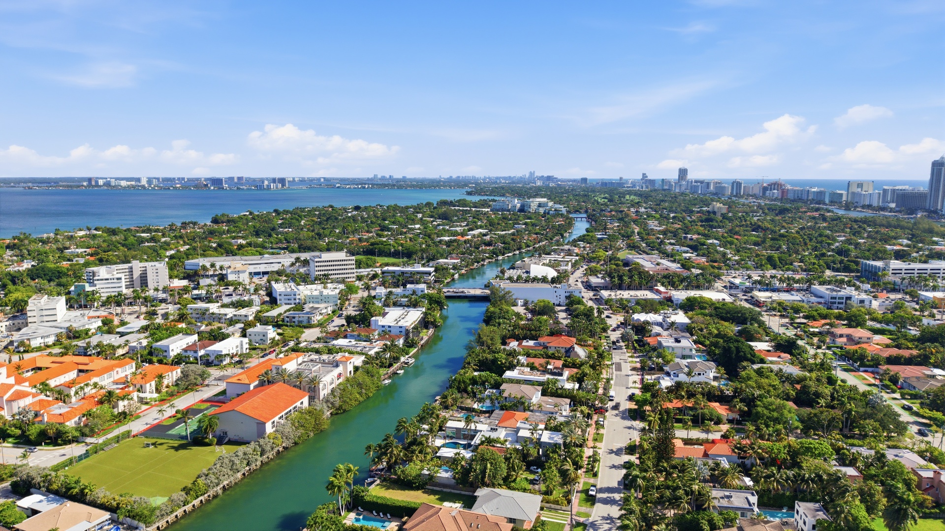 3716 Prairie Avenue Miami Beach, FL 33140 - Photo 12 of 20 an aerial view of residential houses with outdoor space and trees