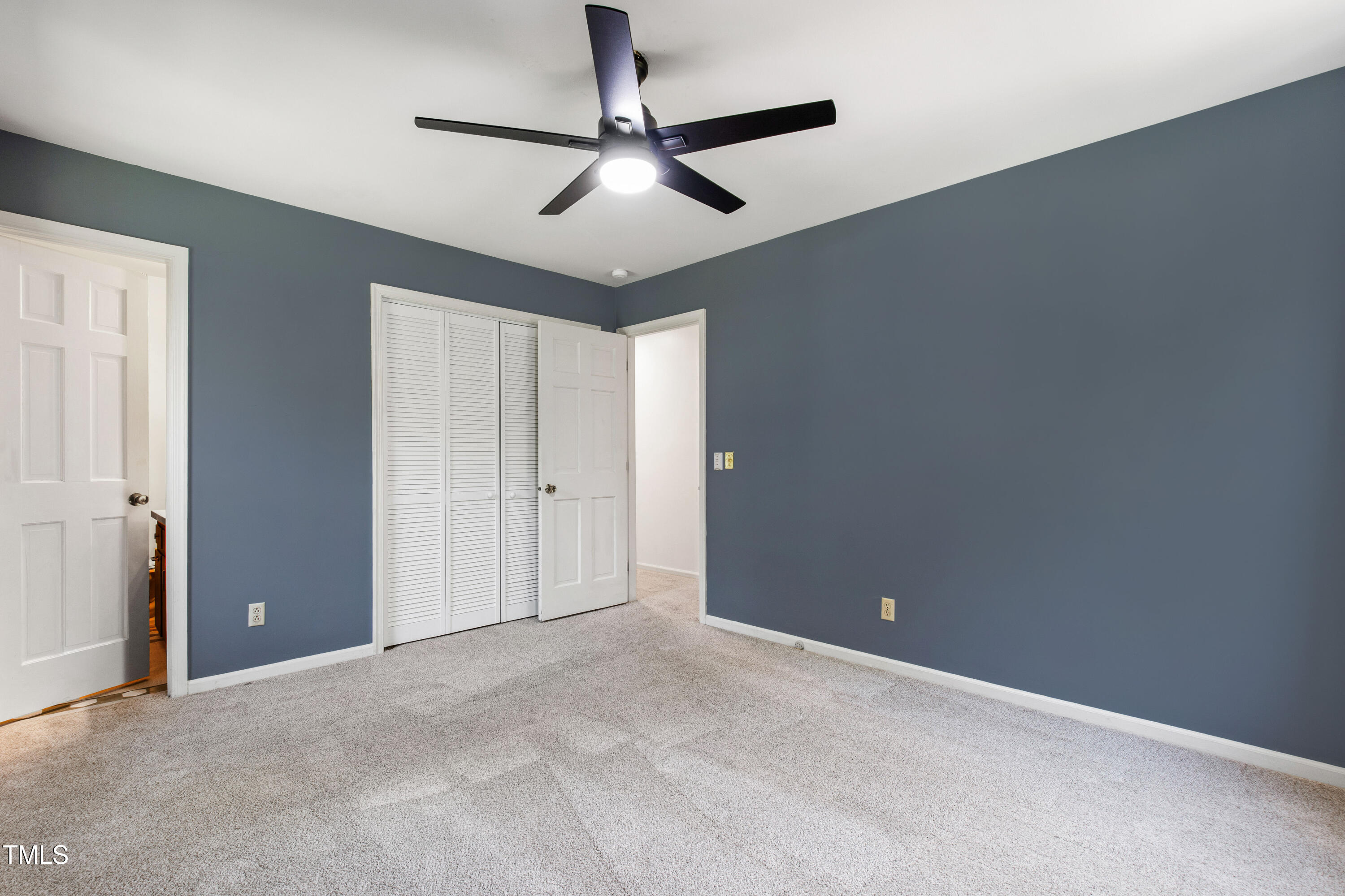 4606 Greenbrier Road Raleigh, NC 27603 - Photo 23 of 49 a view of a livingroom with a ceiling fan
