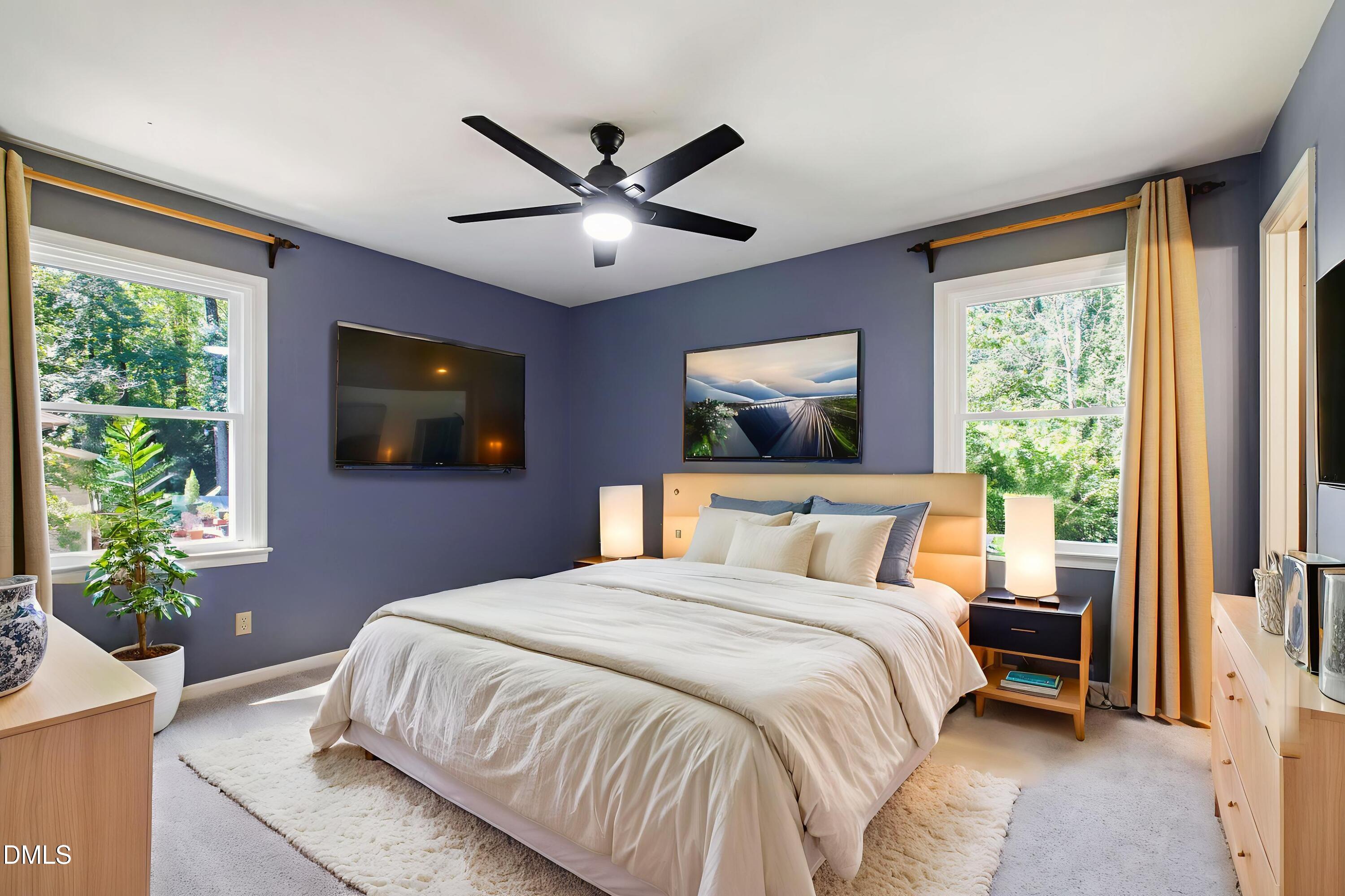 4606 Greenbrier Road Raleigh, NC 27603 - Photo 24 of 49 a bedroom with a large bed and a window