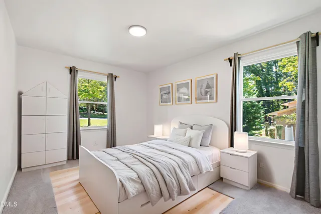 an empty room with closet area