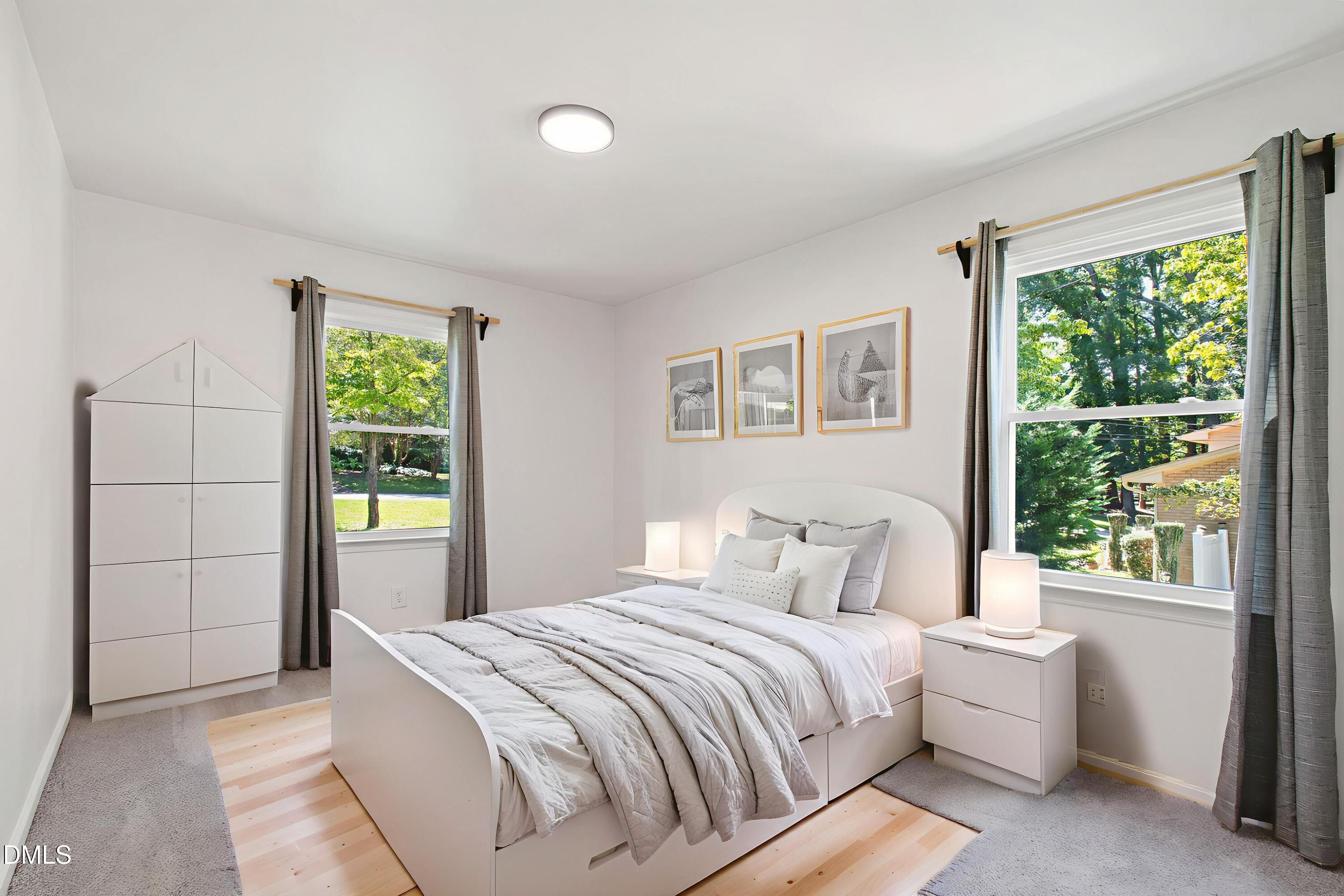 4606 Greenbrier Road Raleigh, NC 27603 - Photo 32 of 49 a bedroom with a bed and a window