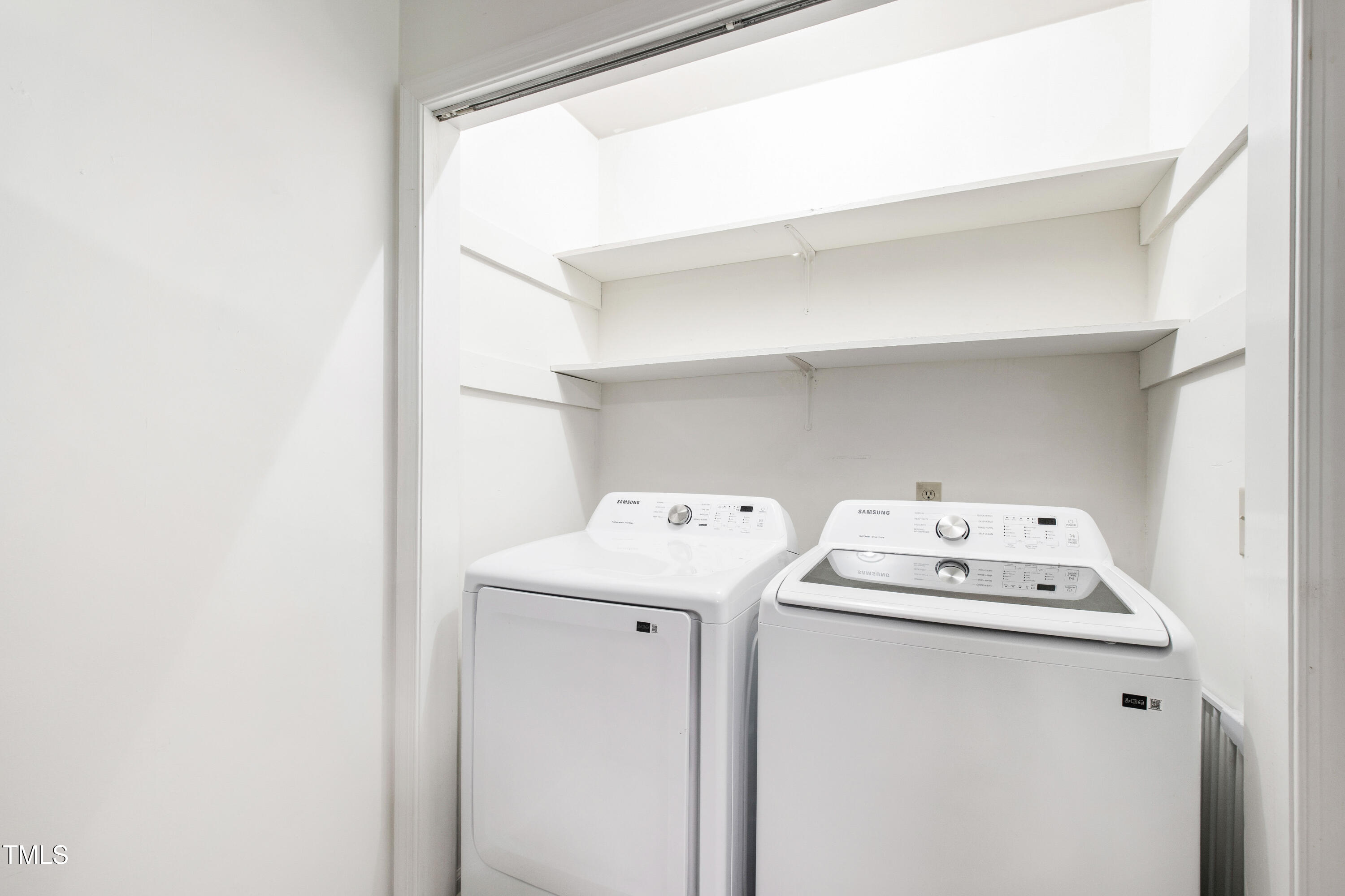 4606 Greenbrier Road Raleigh, NC 27603 - Photo 36 of 49 a utility room with dryer and washer