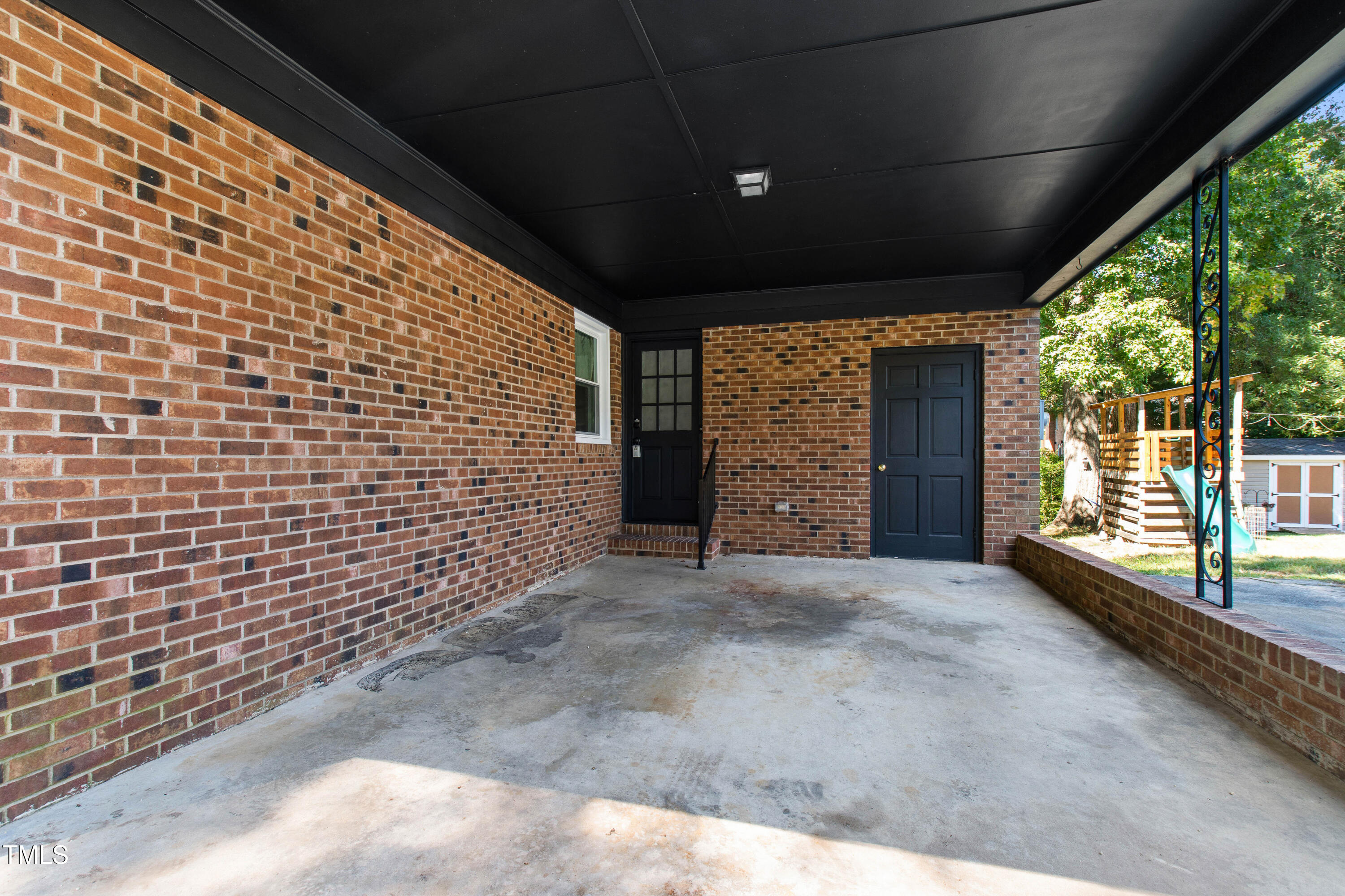 4606 Greenbrier Road Raleigh, NC 27603 - Photo 37 of 49 a view of a porch