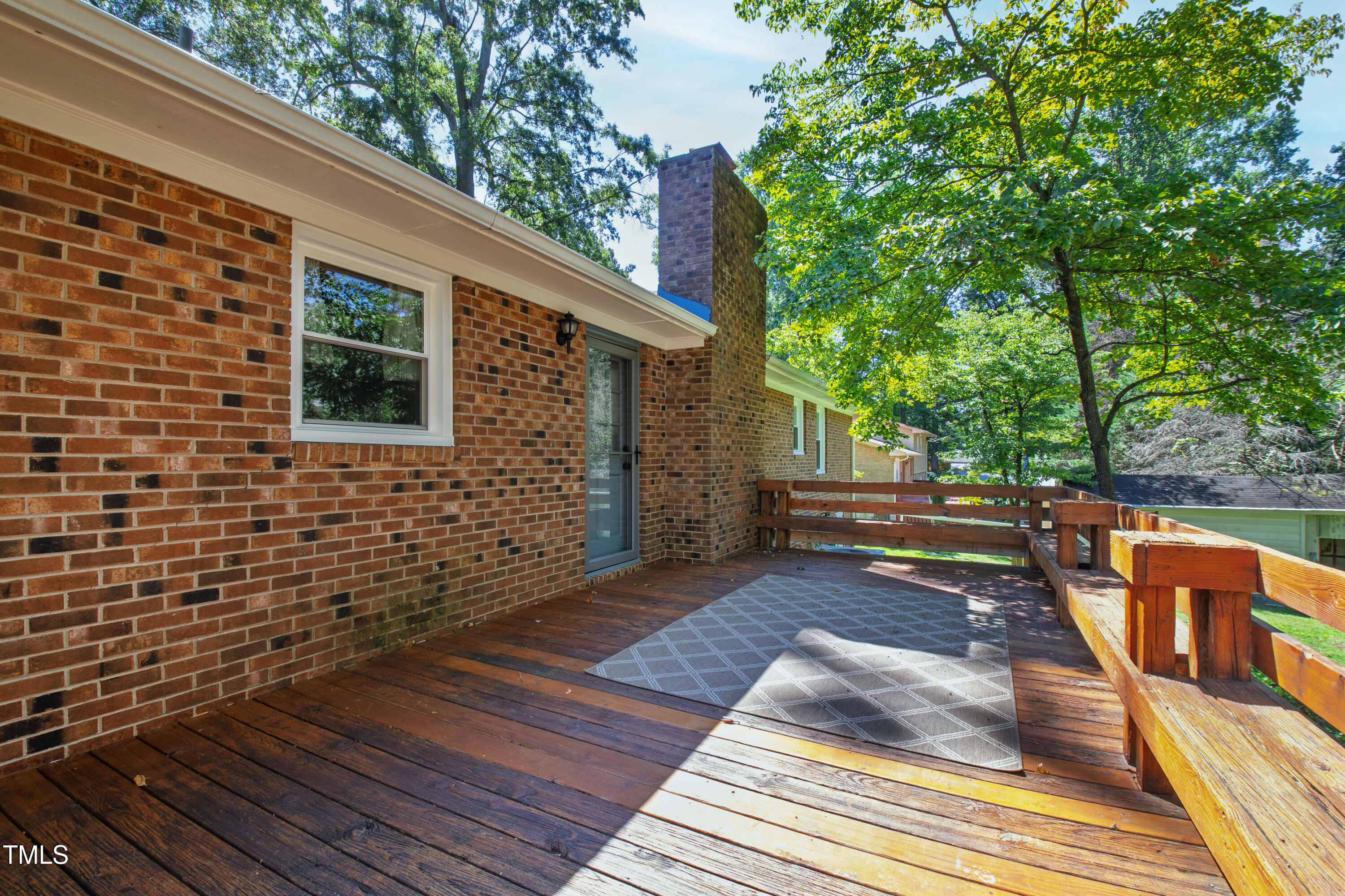 4606 Greenbrier Road Raleigh, NC 27603 - Photo 38 of 49 a view of a house with backyard and sitting area