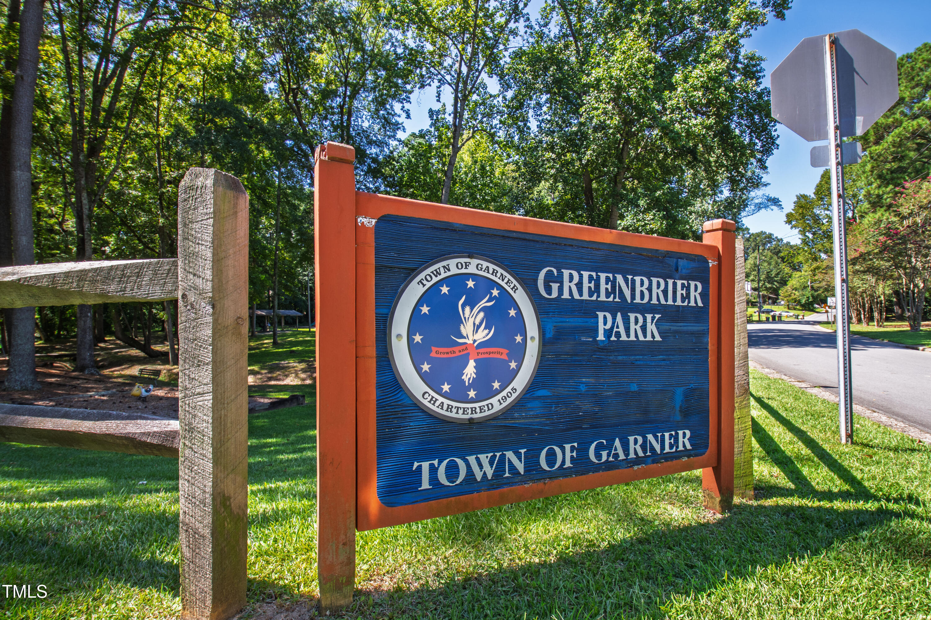 4606 Greenbrier Road Raleigh, NC 27603 - Photo 46 of 49 a sign on the side of the road