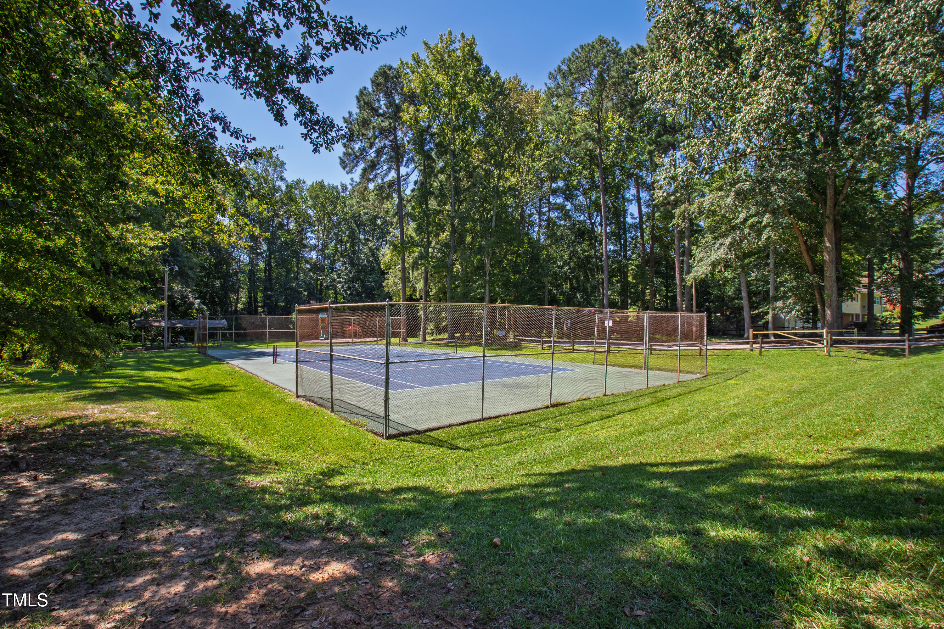 4606 Greenbrier Road Raleigh, NC 27603 - Photo 47 of 49 a view of a park with large trees