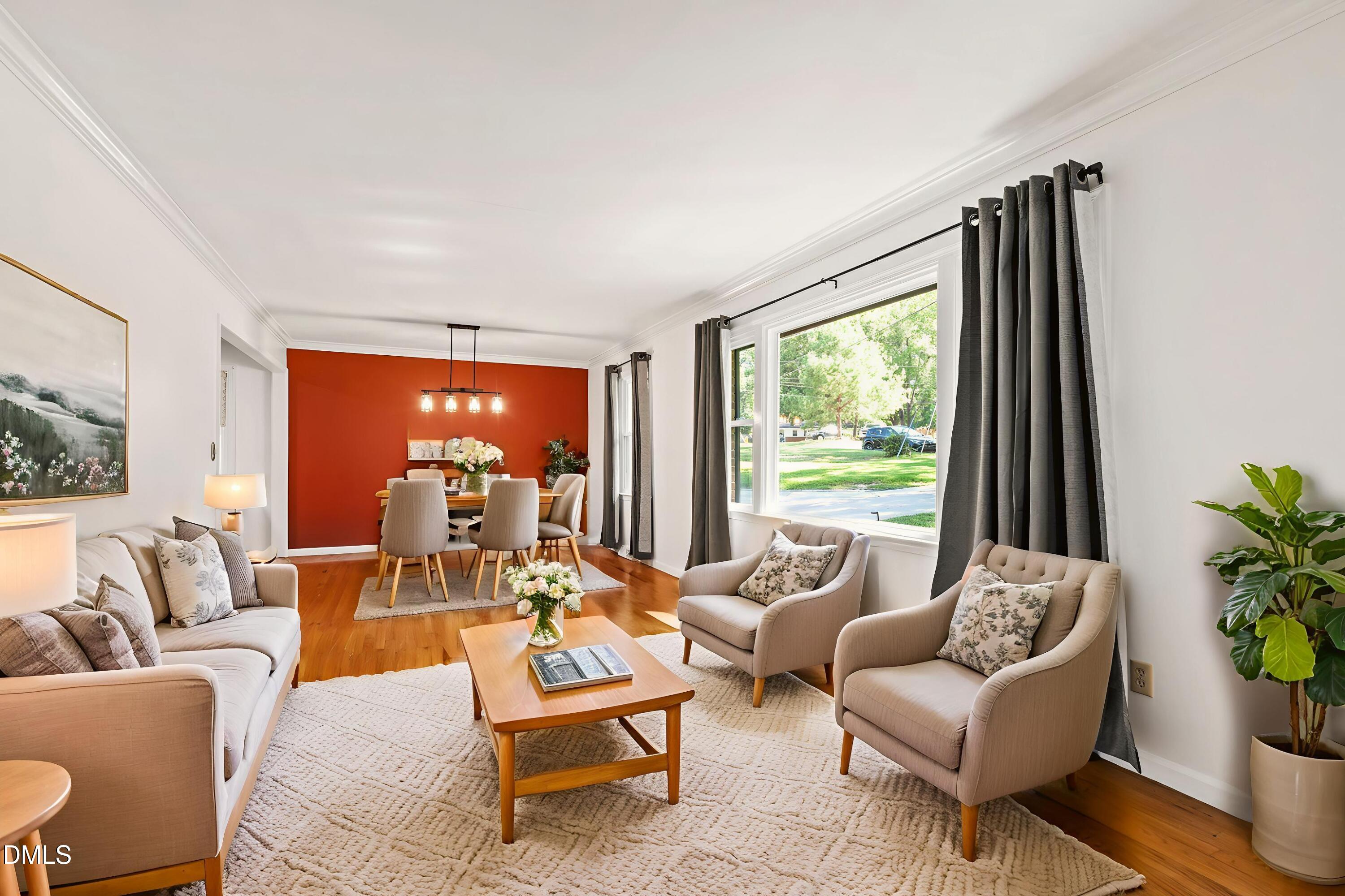 4606 Greenbrier Road Raleigh, NC 27603 - Photo 7 of 49 a living room with furniture and a large window