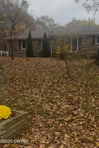 a front view of house with yard