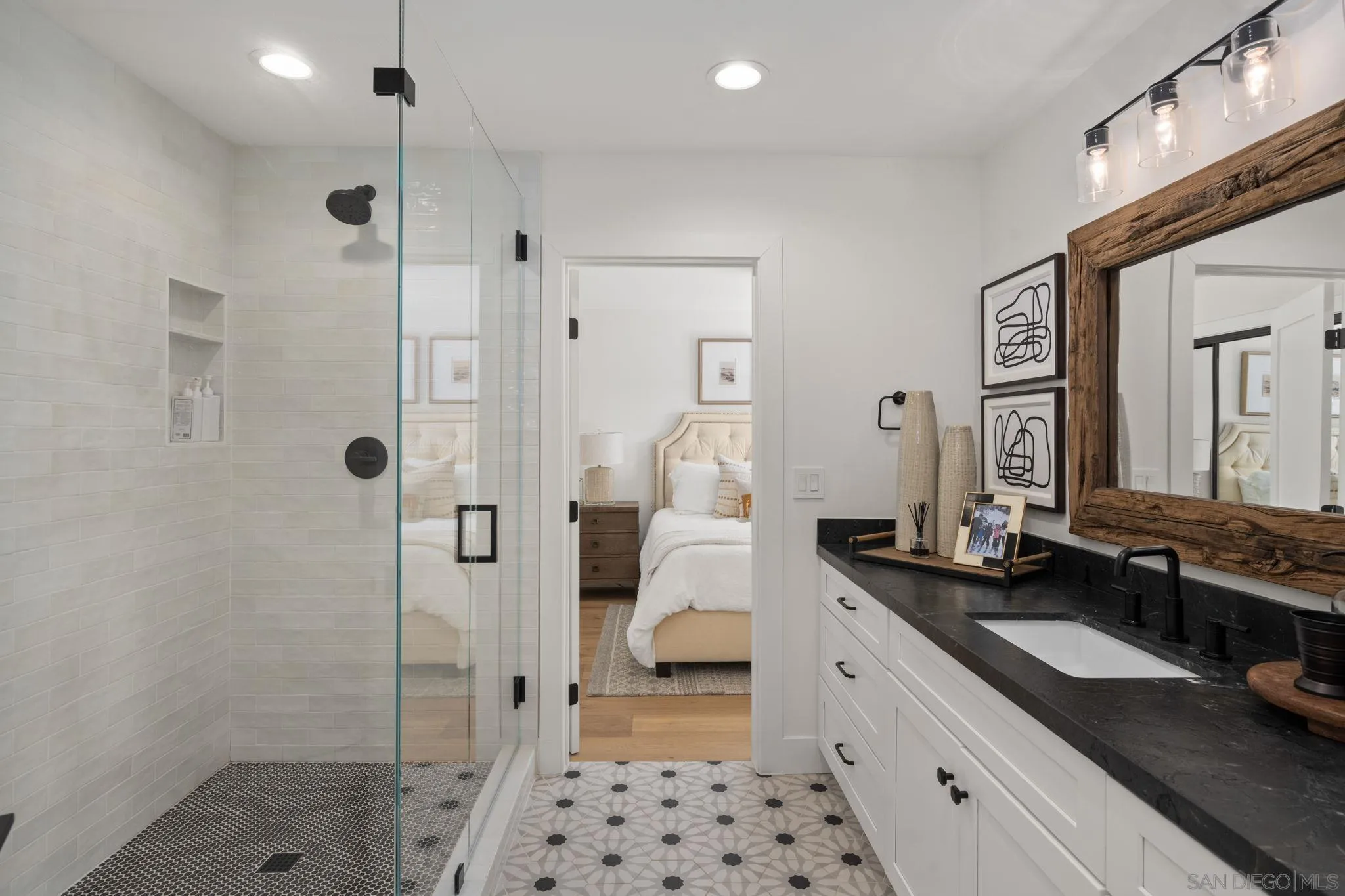 5424 El Cielito Rancho Santa Fe, CA 92067 - Photo 17 of 22 a en suite bathroom with a double vanity sink a large mirror and shower