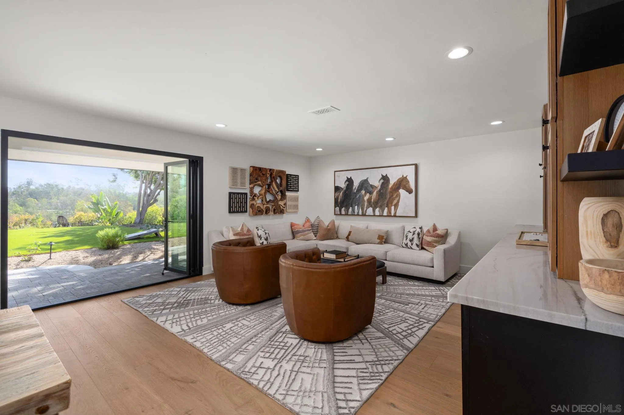 5424 El Cielito Rancho Santa Fe, CA 92067 - Photo 5 of 22 a living room with furniture and a flat screen tv