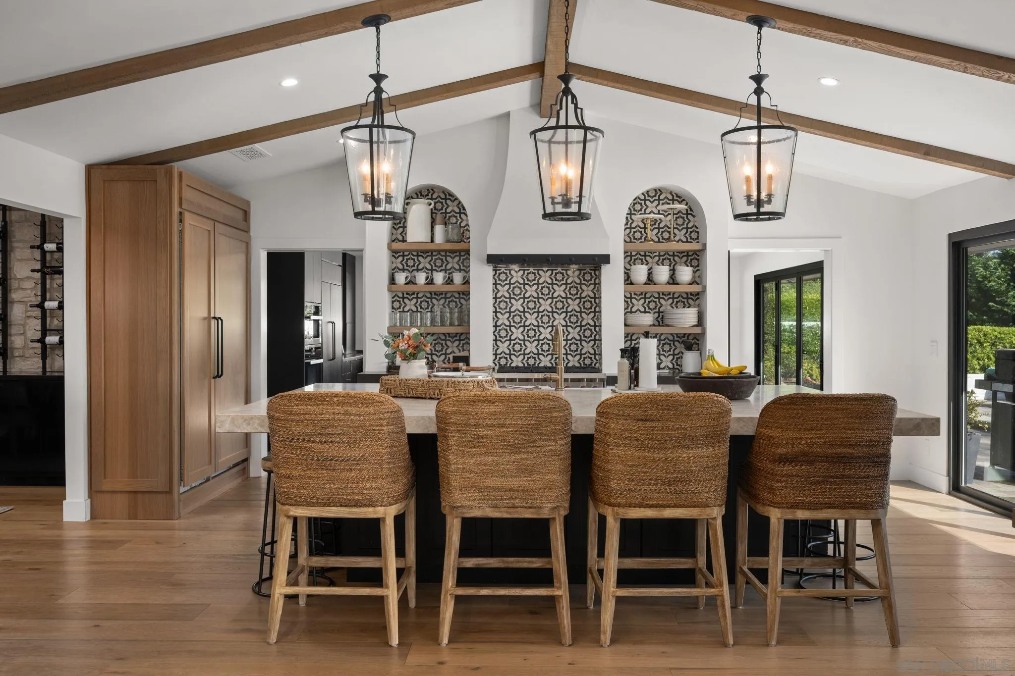 5424 El Cielito Rancho Santa Fe, CA 92067 - Photo 8 of 22 a dining room with furniture a chandelier and wooden floor