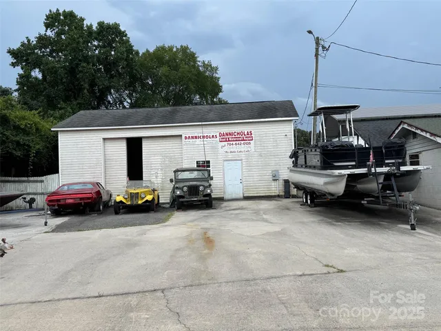 a view of a cars park in front of house
