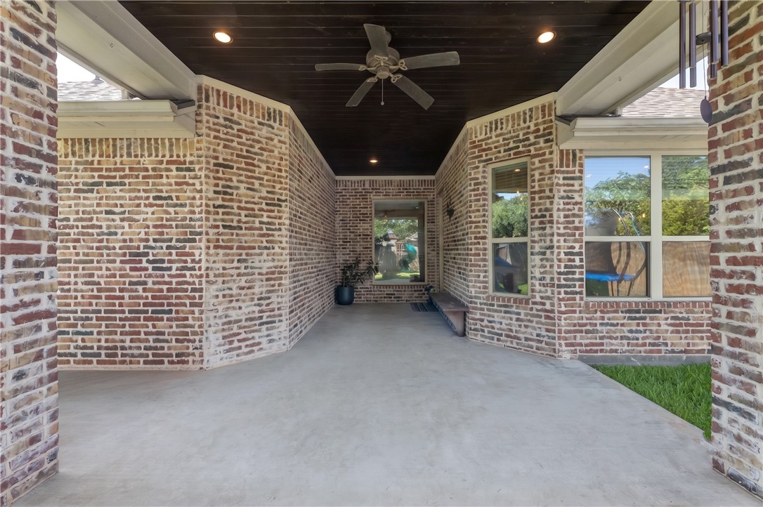 8312 Raintree Drive College Station, TX 77845 - Photo 27 of 30 Covered concrete patio featuring a ceiling fan and recessed lighting