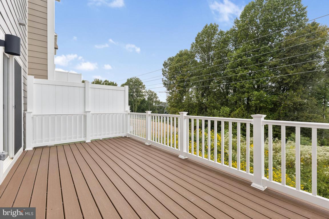 9656 Killenney Place Waldorf, MD 20601 - Photo 19 of 25 a view of a wooden roof with wooden floor and fence