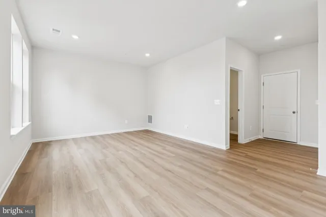 a bathroom with a sink a mirror and a toilet