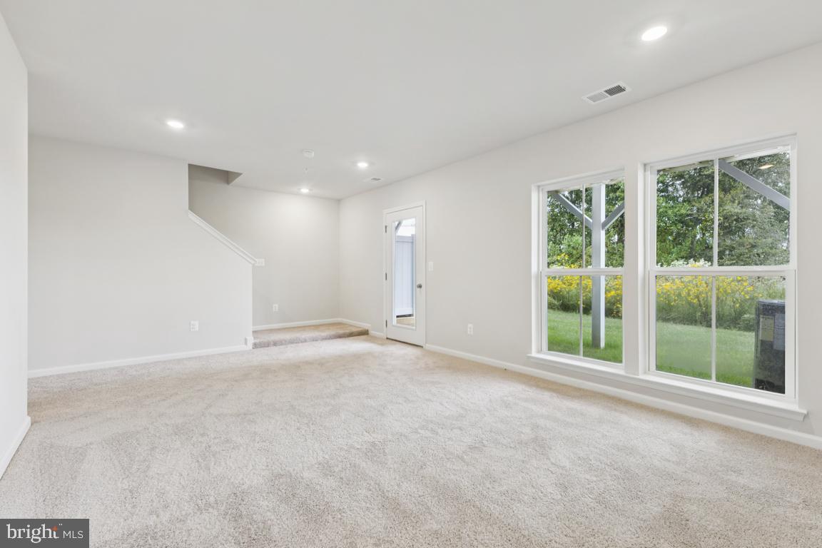 9656 Killenney Place Waldorf, MD 20601 - Photo 24 of 25 a view of an empty room with a window