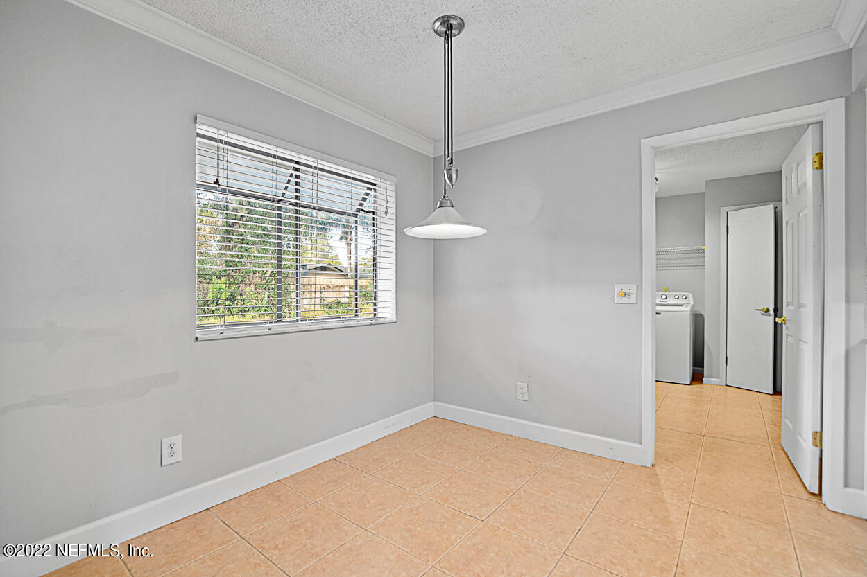 3759 Rustic Lane Jacksonville, FL 32217 - Photo 11 of 32 a view of an empty room with a window