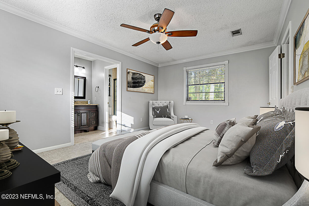 3759 Rustic Lane Jacksonville, FL 32217 - Photo 25 of 32 a bedroom with a bed and window