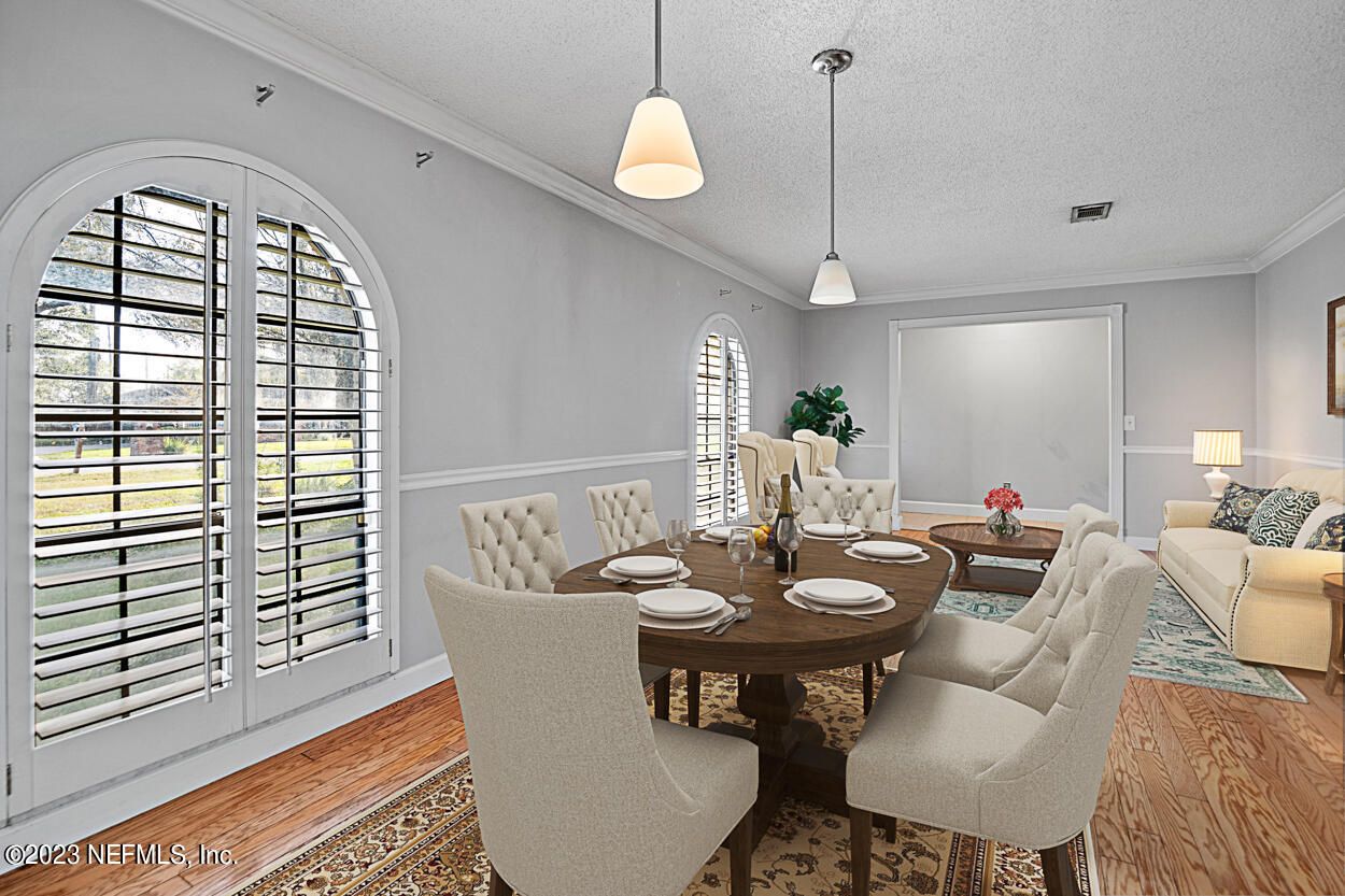 3759 Rustic Lane Jacksonville, FL 32217 - Photo 5 of 32 a living room with furniture a window and a dining table