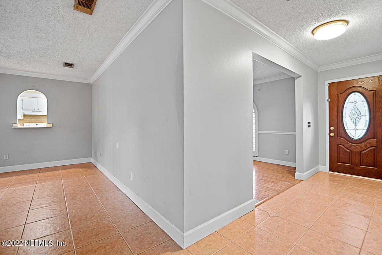 3759 Rustic Lane Jacksonville, FL 32217 - Photo 7 of 32 a view of a hallway with entryway