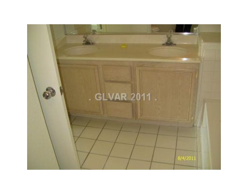 2201 Ramsgate Drive, Unit 128 Henderson, NV 89074 - Photo 11 of 20 Master Bath/Spa. DOUBLE SINKS IN THE MASTER BATHROOM