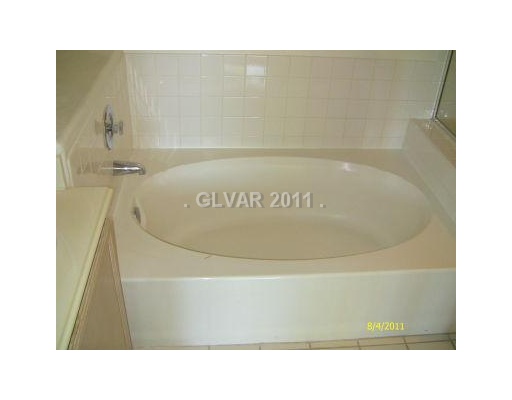 2201 Ramsgate Drive, Unit 128 Henderson, NV 89074 - Photo 13 of 20 Master Bath/Spa. RELAXING SOAKING TUB IN THE MASTER BATHROOM