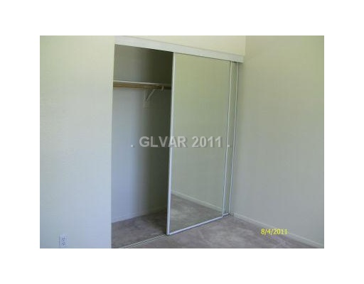 2201 Ramsgate Drive, Unit 128 Henderson, NV 89074 - Photo 15 of 20 Bedroom. LARGE CLOSET WITH MIRRORED DOOR IN THE 2ND BEDROOM