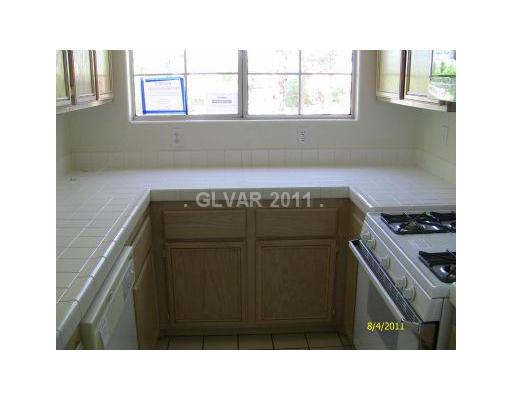 2201 Ramsgate Drive, Unit 128 Henderson, NV 89074 - Photo 6 of 20 Kitchen. STEP SAVER KITCHEN WITH LOTS OF LIGHT
